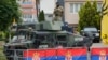 U.S. members of the NATO-led Kosovo Force (KFOR) stand guard outside municipal offices in Leposavic, Kosovo, June 2, 2023. 