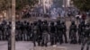 FILE - Senegalese Gendarmerie block a road after protests burned tires and blocked roads in Dakar, June 3, 2023. 