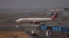 FILE - An Air India passenger aircraft is seen on the tarmac at Chhatrapati Shivaji International airport in Mumbai, India, Feb. 14, 2023