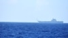 FILE - A helicopter takes off from China's Shandong aircraft carrier over Pacific Ocean waters south of Okinawa prefecture, Japan, in this handout photo taken April 15, 2023, and released by the Joint Staff Office of the Defense Ministry of Japan.