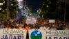 People hold banners reading, "We Won't Give up Jadar!" and march during a protest against pollution and the exploitation of a lithium mine in the country in Belgrade, Serbia, Aug. 10, 2024.