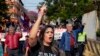 Kattya González, a popular senator and vocal government critic who was booted from the Senate in February, marches in an opposition rally, marking a year since President Santiago Pena's inauguration, in Asuncion, Paraguay, Aug. 15, 2024.