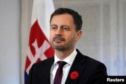 FILE - Slovakian Prime Minister Eduard Heger listens during a news conference in Tallinn, Estonia, Nov. 11, 2022.
