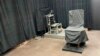 FILE - This undated photo provided by the South Carolina Department of Corrections shows the state's death chamber in Columbia, S.C., including the electric chair, right, and a firing squad chair, left. 
