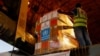 FILE - Aid supplies from World Health Organization (WHO) and UAE-AID are loaded into a plane for Port Sudan, at the Abu Dhabi International Airport, Abu Dhabi, United Arab Emirates, May 5, 2023. 