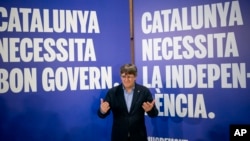 FILE - Former regional president Carles Puigdemont poses for a photo during a campaign rally in Argelers, France, May 8, 2024. 