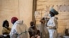 FILE - Health workers treat cholera patients at the Bwaila Hospital in Lilongwe central Malawi, Jan. 11, 2023. South Africa reported its first cholera death in February, after the virus arrived in the country from Malawi.