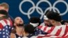 United States' Stephen Curry reacts with his team after winning a men's gold medal basketball game against France at Bercy Arena, Aug. 10, 2024, in Paris.
