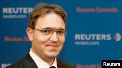 FILE - Ludovit Odor, member of the Bank Board of Slovak National Bank, smiles during the Reuters Central European Investment Summit in Vienna, Austria, Oct. 16, 2007. Zuzana Caputova picked Odor to lead a technocrat government, after caretaker prime minister quit, May 7, 2023.