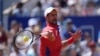 Serbia's Novak Djokovic returns the ball to Spain's Rafael Nadal during their men's singles second round match at the Roland Garros stadium at the 2024 Summer Olympics, July 29, 2024, in Paris, France. 