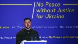 International Edition: Ukraine’s President Makes A Surprise Visit To The International Criminal Court In The Hague
