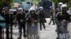 Polish Kosovo Force (KFOR) soldiers stand guard at a municipal office in Zvecan, Kosovo, May 30, 2023.