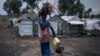 ces deux femmes avaient été tuées parce qu'accusées par une partie de la population de pratiquer la sorcellerie et "d'être derrière le décès de plusieurs personnes" de la communauté. (Photo by ALEXIS HUGUET / AFP)