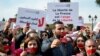 FILE - Journalists in Tunis, Tunisia, protest the threat of danger the press faces and the return to the country's dictatorship, Feb.16, 2023.