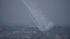 Roket ditembakkan ke arah Israel dari Jalur Gaza pada Senin, 9 Oktober 2023. (AP Photo/Hatem Moussa)