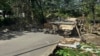 A bridge washed out in Oxford, Conn., after torrential rains turned streets into raging rivers in parts of Connecticut and New York's Long Island, trapping people in cars and sweeping two women to their deaths, authorities said, Aug. 19, 2024.