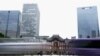 Vehicles pass by the Tokyo Station Friday, May 26, 2023, in Tokyo. A strong earthquake shook eastern Japan on Friday evening, but there was no tsunami warning.
