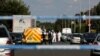 Police work at the scene where a man was arrested after people were stabbed in Southport, Britain, July 29, 2024.