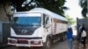 <br />
Los camiones que transportan haitianos indocumentados salen de un centro de detención de inmigrantes en Haina, cerca de Santo Domingo, República Dominicana, 17 de mayo de 2024.&nbsp;