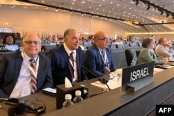 Delegasi dari Israel menghadiri sesi Komite Warisan Dunia ke-45 UNESCO di Riyadh, 11 September 2023, menandai kunjungan pertama negara tersebut ke Arab Saudi yang diumumkan secara publik. (Rania SANJAR / AFP)