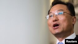 Xie Feng, China's new ambassador to the United States, addresses the media as he arrives at John F. Kennedy International Airport in New York, May 23, 2023. 