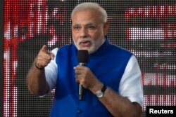 নিউইয়র্কের সেন্ট্রাল পার্কে গ্লোবাল সিটিজেন ফেস্টিভ্যাল কনসার্টের সময় মঞ্চে বক্তব্য রাখছেন ভারতের প্রধানমন্ত্রী নরেন্দ্র মোদি । ২৭ সেপ্টেম্বর, ২০১৪। (ফাইল ছবি)