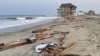 This photo provided by the National Park Service, Aug. 16, 2024, in Rodanthe, North Carolina, along the Cape Hatteras National Seashore shows debris from an unoccupied beach house that collapsed into the Atlantic Ocean from winds and waves caused by Hurricane Ernesto. 