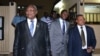  Crepin Mboli-Goumba (Centre) arrivent à Bangui le 15 janvier 2013. AFP PHOTO / PATRICK FORT (Photo by PATRICK FORT / AFP)