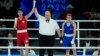 Taiwan's Lin Yu-ting, left, celebrates after defeating Turkey's Esra Yildiz in their women's 57 kg semifinal boxing match at the 2024 Summer Olympics, Aug. 7, 2024, in Paris.