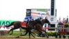 National Treasure, right, with jockey John Velazquez, edges out Blazing Sevens, with jockey Irad Ortiz Jr., to win the148th running of the Preakness Stakes horse race at Pimlico Race Course, May 20, 2023, in Baltimore, Maryland.