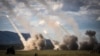 A missile is launched from a U.S. HIMARS system during joint military drills at a firing range in northern Australia, July 22, 2023. U.S. officials said the latest package of aid to Ukraine includes munitions for HIMARS.