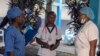 Medical staff talk to one other at the general hospital in Goma, Democratic Republic Of Congo on Aug. 14, 2024, after the World Health Organization declared the mpox outbreaks in Congo and elsewhere in Africa a global emergency. 