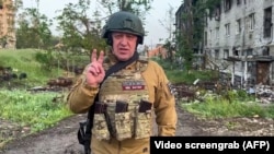 FILE - This video grab taken from handout footage posted on May 25, 2023, on the Telegram account of the press service of Concord -- a company linked Russian mercenary group Wagner head Yevgeny Prigozhin -- shows Prigozhin speaking in Bakhmut. 
