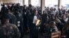 Les accusés siègent au tribunal militaire de Goma, dans l'est de la République démocratique du Congo, lors de leur procès le 15 septembre 2023.