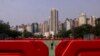 A worker sprays water on Victoria Park, as the government closed parts of the traditional venue of the city's annual Tiananmen crackdown vigil for "maintenance works," in Hong Kong, May 30, 2023.