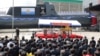 Pemimpin Korea Utara Kim Jong Un menghadiri upacara peluncuran kapal selam taktis bertenaga nuklir di Korea Utara, 8 September 2023. AS, Jepang, Korsel akan mengadakan pertemuan, membahas ancaman yang ditimbulkan Korea Utara, (Foto: KCNA via REUTERS)