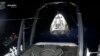 In this frame grab from video broadcast by SpaceX, recovery crews lift and secure the SpaceX Dragon capsule after it splashed down into the Gulf of Mexico, just off the Florida Panhandle, on May 30, 2023. (SpaceX via AP)