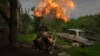 A Ukrainian soldier fires a mortar at Russian positions on the front line near Bakhmut, Donetsk region, Ukraine, May 28, 2023.