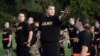 FILE - Students gather during physical training exercises in the Army prep course at Fort Jackson in Columbia, South Carolina, on Aug. 27, 2022. The Army will expand its basic combat training for newly enlisted soldiers beginning in October 2024, officials said.