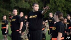 FILE - Students gather during physical training exercises in the Army prep course at Fort Jackson in Columbia, South Carolina, on Aug. 27, 2022. The Army will expand its basic combat training for newly enlisted soldiers beginning in October 2024, officials said.