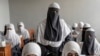 Afghan girls attend a religious school that remained open since the last year's Taliban takeover, in Kabul, Afghanistan, Aug. 11, 2022. For most teenage girls in Afghanistan, it’s been a year since they set foot in a classroom. 