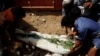 Shiite rebels known as Houthis, bury a fellow Houthi, who was killed in a suicide bomb attack during his funeral in Sana'a, Yemen, Sept. 4, 2015.