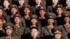 Shugaban kasar Koriya ta arewa Kim Jong Il da dansa Kim Jong Un, a cikin wannan hoton da kamfanin dillancin labarai na Koriya ya fitar ranar laraba 6 ga watan Oktoba. 2010,