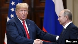 Президента США та Росії на зустрічі у Гельсінкі
