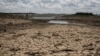 This photo shows the fast-drying catchment area of the Umzingwani dam in Matabeleland, southwestern Zimbabwe, Feb. 7, 2016. President Robert Mugabe had declared a state of disaster two days earlier in many rural areas hit by a severe drought.