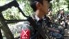 လိုင်ဇာမြို့အနီးမှာတွေ့ရတဲ့ KIA တပ်ဖွဲ့ဝင်တချို့ ( ဓာတ်ပုံ-AP) 