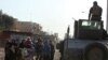 Displaced people flee during a battle with Islamic State militants in the al-Zuhoor neighborhood of Mosul, Iraq, Jan. 8, 2017. 