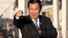 Cambodia's Prime Minister Hun Sen gestures as he arrives for a group photo of leaders at the 11th Asia-Europe Meeting (ASEM) in Ulaanbaatar, Mongolia, Saturday, July 16, 2016. (AP Photo/Mark Schiefelbein)