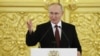 Presiden Rusia Vladimir Putin menyampaikan pidato saat acara penyambutan sejumlah duta besar negara-negara asing untuk Rusia yang baru di Moskow pada 4 Desember 2023. (Foto: AFP/Poll/Vyacheslav Prokofyev)