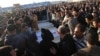 People attend the funeral of policemen killed in a truck bomb blast at a police training school in the western Libyan town of Zliten, Jan. 7, 2016.